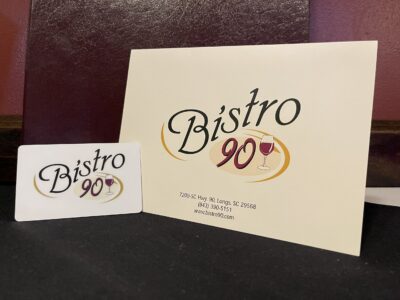 gift card next to envelope with Bistro 90 logo